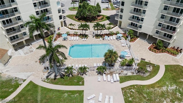 view of swimming pool with a patio