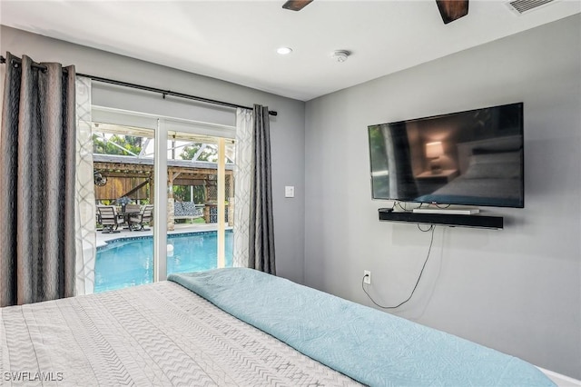 bedroom featuring ceiling fan and access to exterior