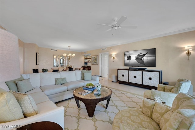 living room featuring ornamental molding and ceiling fan with notable chandelier