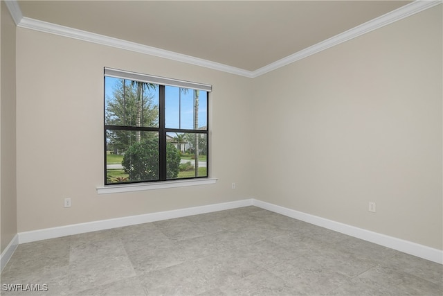 unfurnished room featuring crown molding