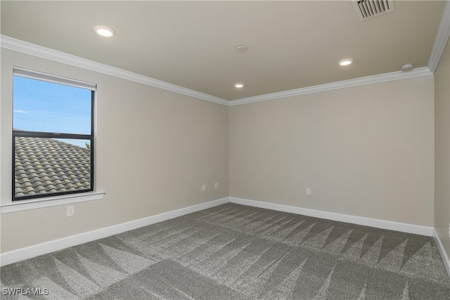 carpeted spare room with crown molding