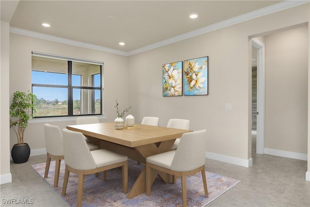 dining room with crown molding