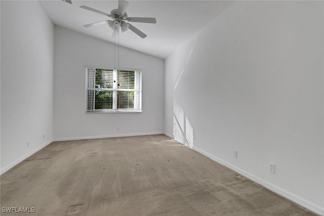 9234 Springview Loop, Estero, FL 33928 - spare room featuring carpet, vaulted ceiling, a ceiling fan, and baseboards