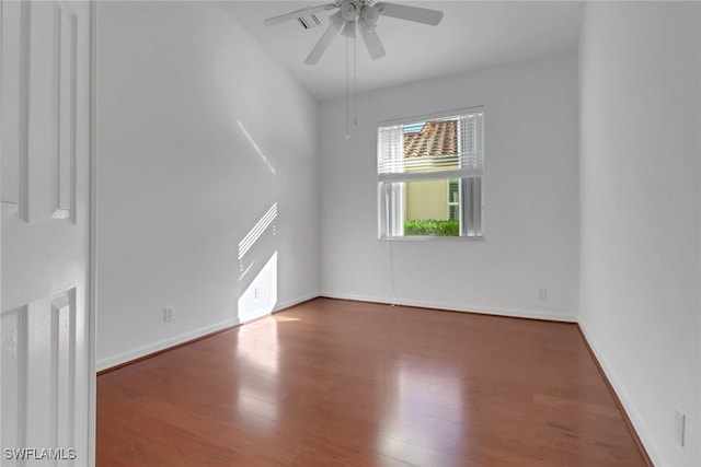 9234 Springview Loop, Estero, FL 33928 - empty room with ceiling fan, wood finished floors, and baseboards