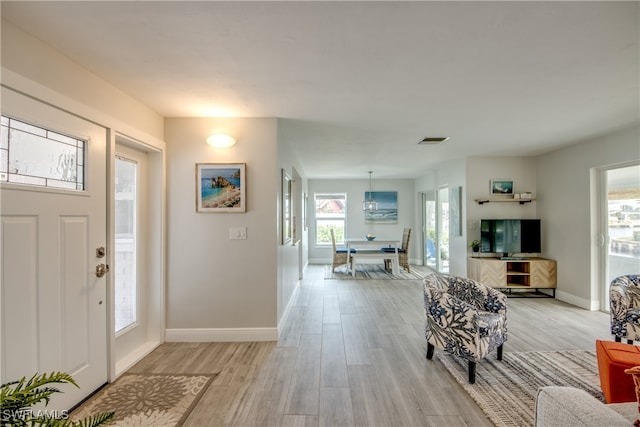 foyer entrance featuring light hardwood / wood-style flooring