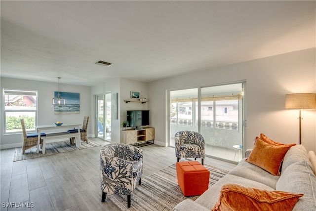 living room featuring light wood-type flooring