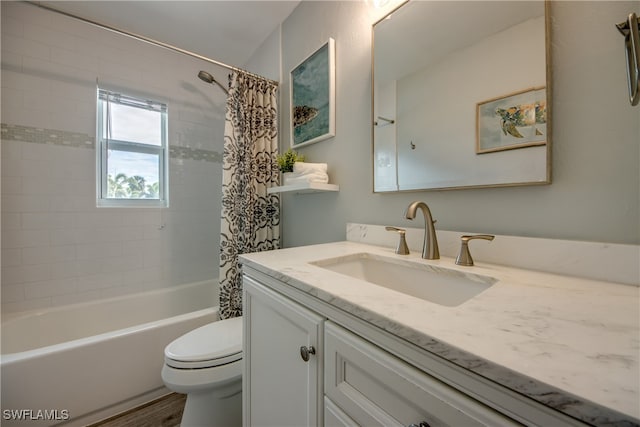 full bathroom with toilet, shower / tub combo, and vanity