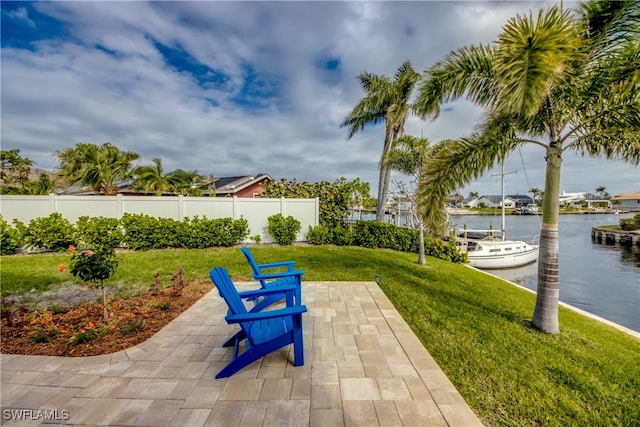 view of patio / terrace featuring a water view