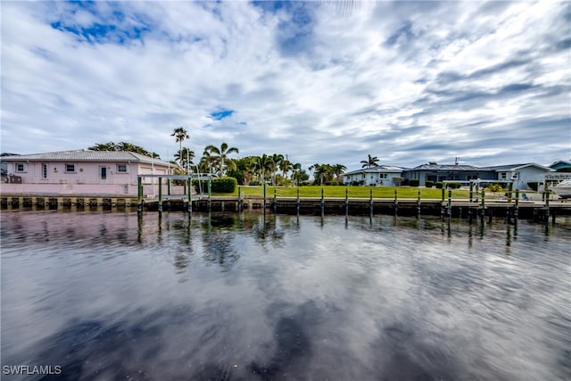 water view featuring a dock