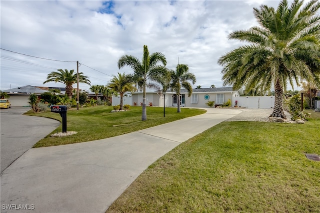 view of front of home featuring a front lawn