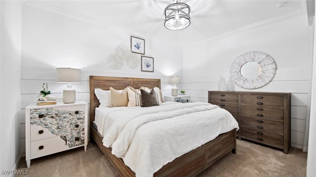 bedroom featuring carpet flooring, a notable chandelier, and ornamental molding