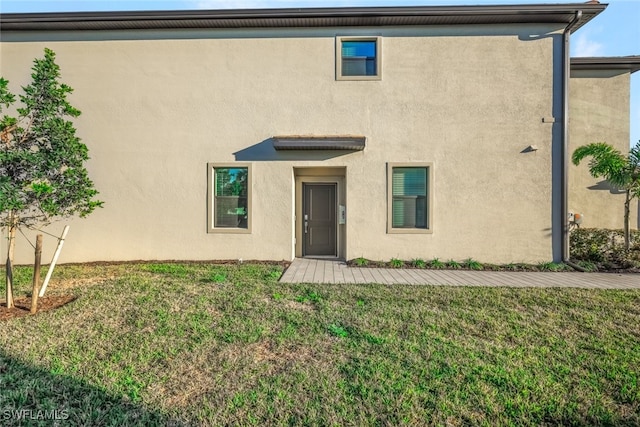 exterior space featuring a front yard