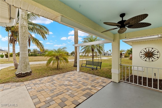 view of patio / terrace featuring ceiling fan