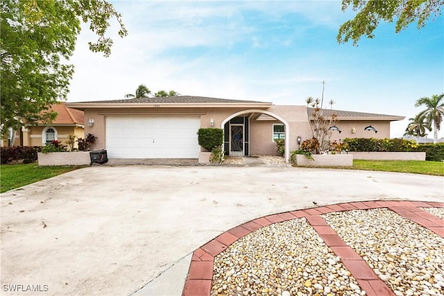 ranch-style house featuring a garage