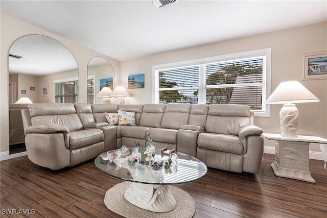 living room featuring dark wood-type flooring