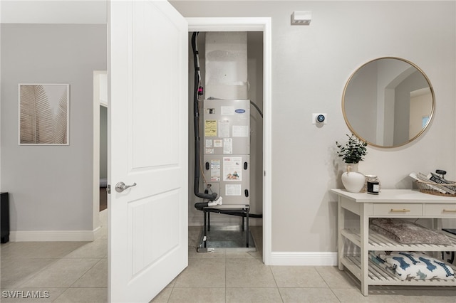 bathroom with tile patterned floors