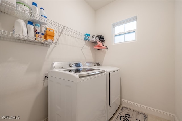 laundry room featuring washing machine and dryer