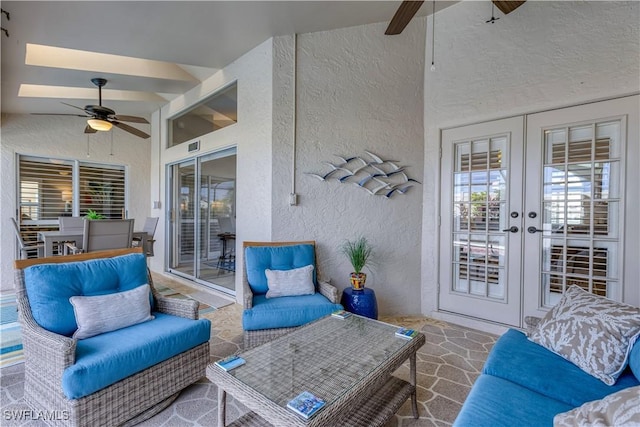 view of patio with an outdoor hangout area, ceiling fan, and french doors