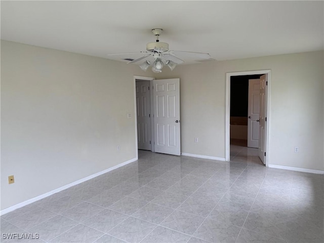 spare room featuring ceiling fan