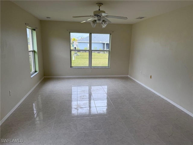 spare room featuring ceiling fan