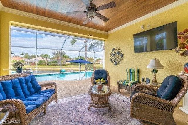 sunroom featuring ceiling fan, wooden ceiling, a wealth of natural light, and a pool