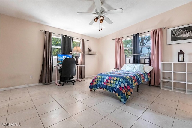 bedroom with light tile patterned floors and ceiling fan