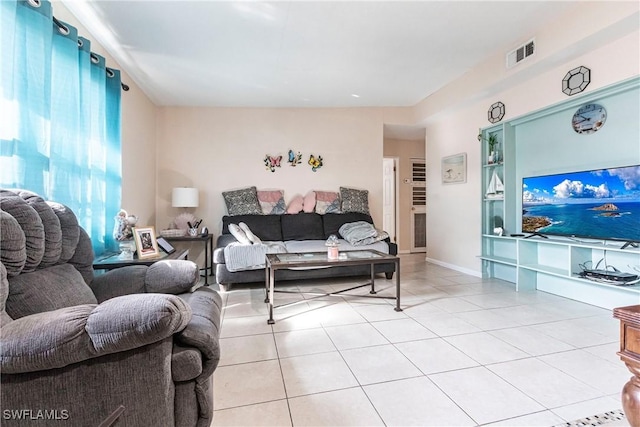 living room featuring light tile patterned floors