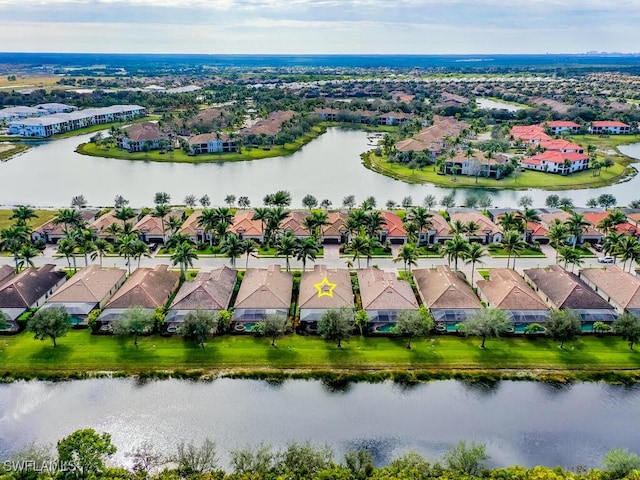 drone / aerial view with a water view