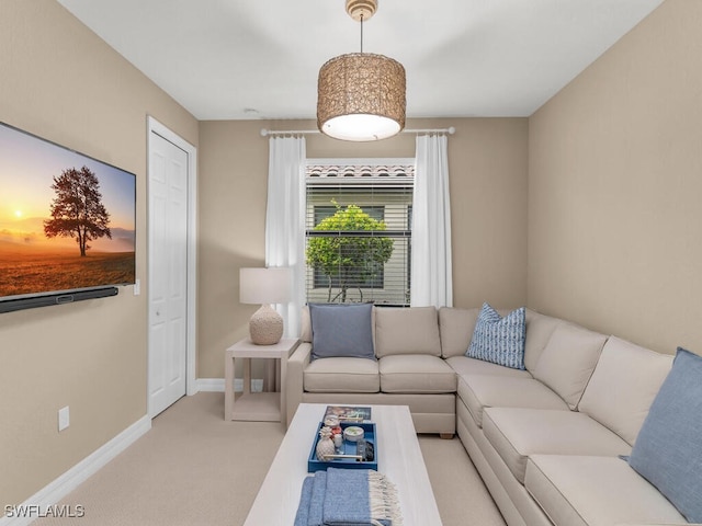 living room featuring light carpet