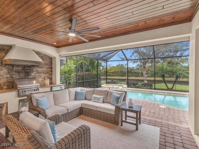 view of patio with a swimming pool with hot tub, glass enclosure, area for grilling, an outdoor hangout area, and an outdoor kitchen