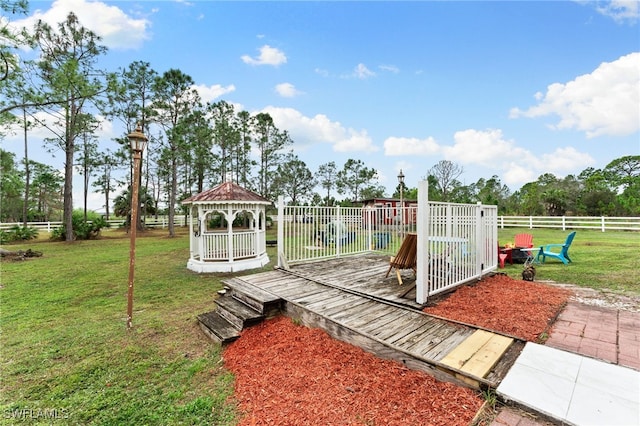 exterior space featuring a gazebo and a yard