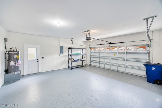 garage featuring water heater, a garage door opener, and electric panel