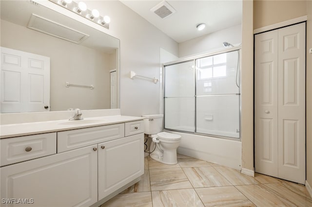 full bath with a closet, visible vents, and bath / shower combo with glass door