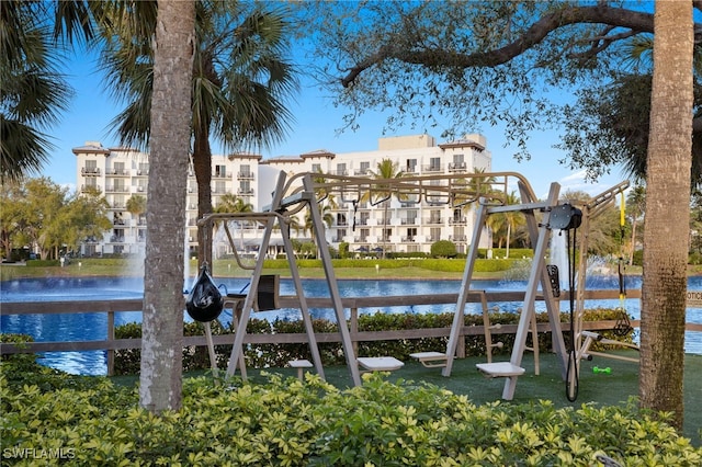 view of community with a water view