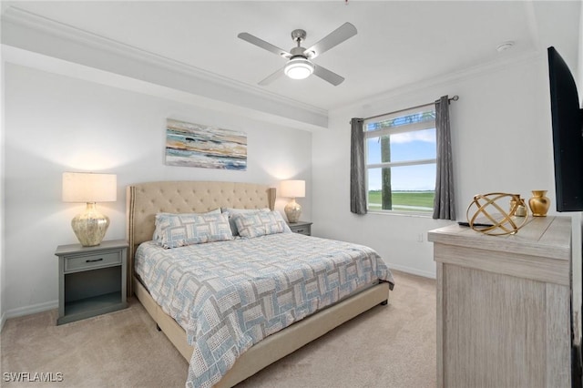 bedroom with crown molding, light carpet, and ceiling fan