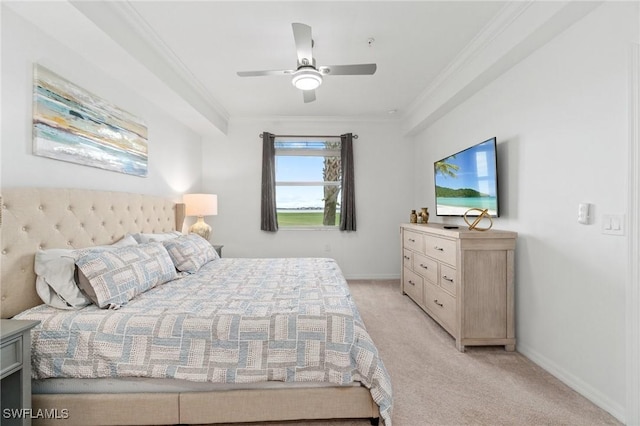 carpeted bedroom featuring ceiling fan and crown molding