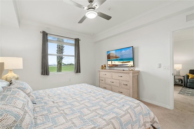 bedroom featuring light colored carpet, ceiling fan, and ornamental molding