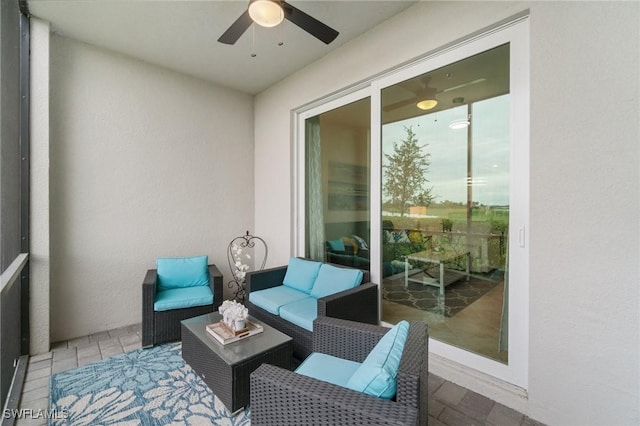 view of patio / terrace featuring ceiling fan