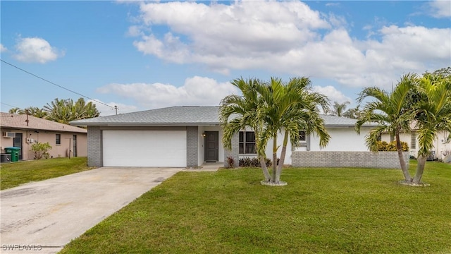 single story home featuring a garage and a front lawn