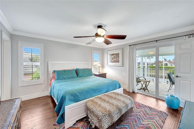 bedroom featuring crown molding, dark wood-type flooring, access to exterior, and ceiling fan