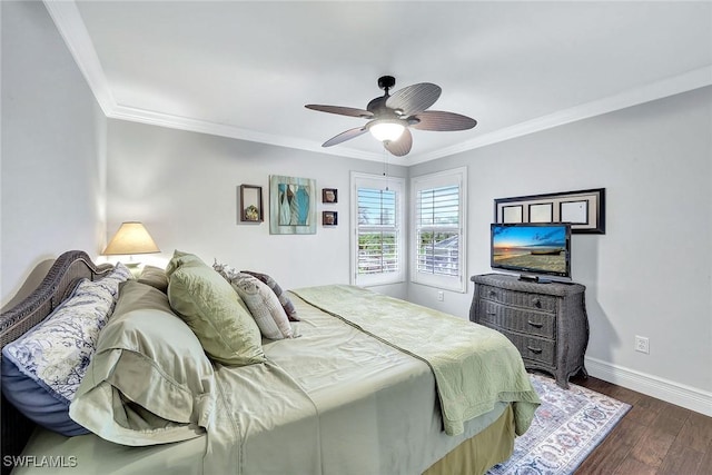 bedroom with dark hardwood / wood-style flooring, crown molding, and ceiling fan