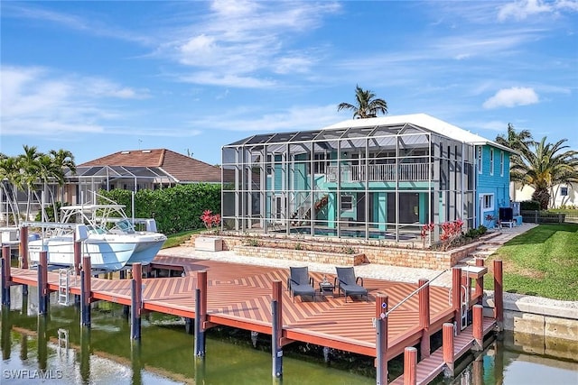 view of dock featuring a pool, a water view, and glass enclosure