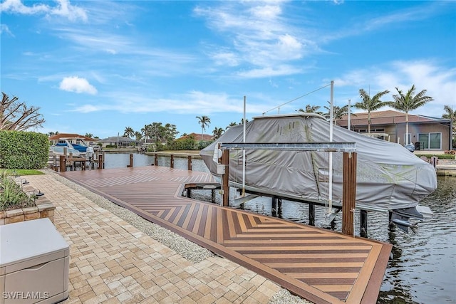 view of dock with a water view