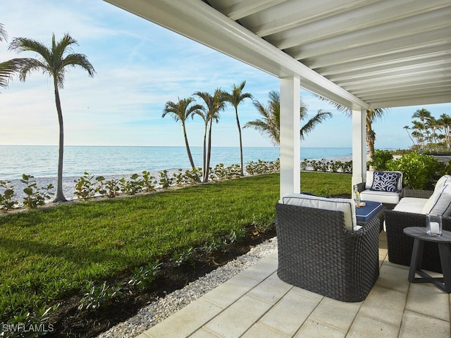 view of patio / terrace featuring a water view and an outdoor hangout area