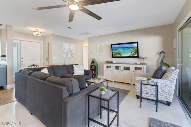 living room with ceiling fan