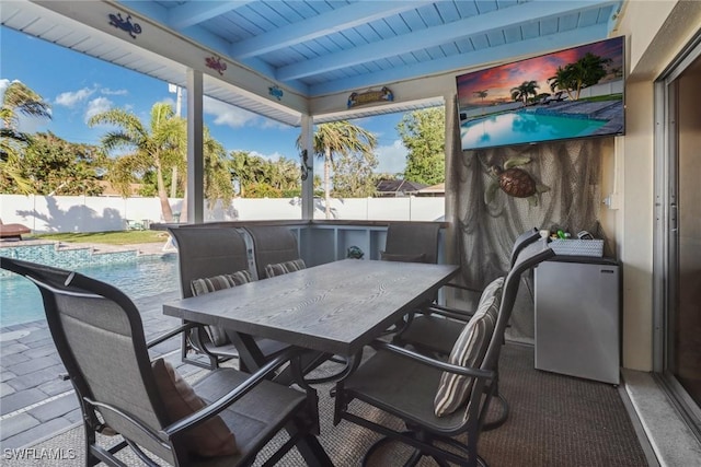 view of patio featuring a fenced in pool