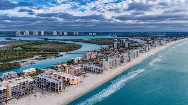 aerial view with a view of the beach and a water view