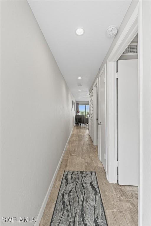 25850 Hickory Blvd Unit A-104, Bonita Springs, FL 34134 - hallway with recessed lighting and baseboards