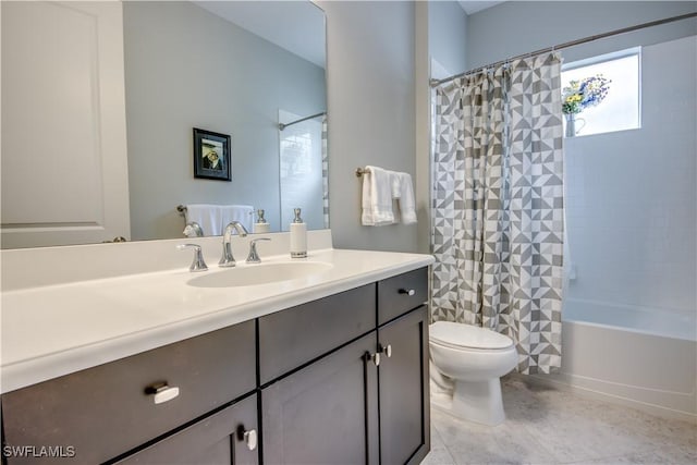 full bathroom featuring toilet, vanity, and shower / bath combination with curtain