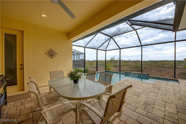 view of patio / terrace with glass enclosure